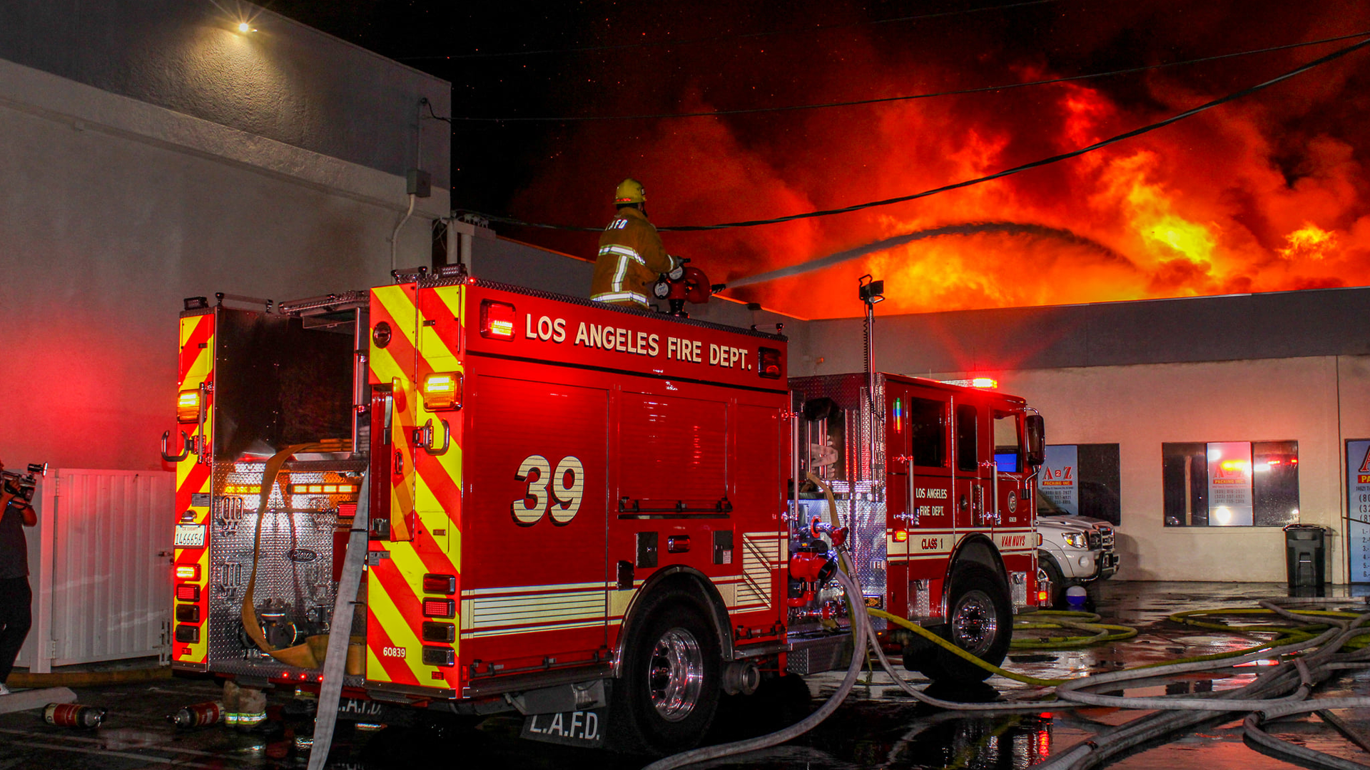Firefighters battle a structure fire in Los Angeles in August 2021.