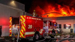 Firefighters battle a structure fire in Los Angeles in August 2021. Firefighters battle a structure fire in Los Angeles in August 2021.