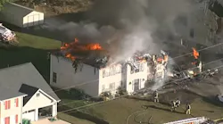 A home burns in Lithonia, GA, on Monday, Nov. 1, 2021.