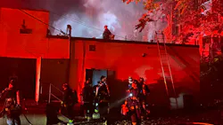 Boson firefighters work to extinguish a fire that broke out a shuttered yoga studio on Monday, Nov. 1, 2021.