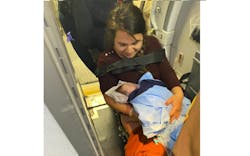 Firefighters helped deliver a new baby girl after arriving on a flight from Mexico to Atlanta. Firefighters helped deliver a new baby girl after arriving on a flight from Mexico to Atlanta.