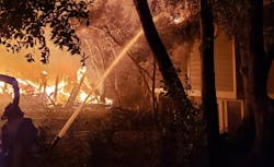 Firefighters work to control one flames involving one of many structures on Bald Head Island. Firefighters work to control one flames involving one of many structures on Bald Head Island.