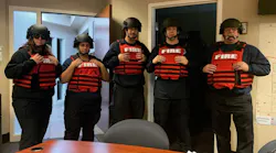 Brownsburg Fire Territory personnel display new safety equipment.