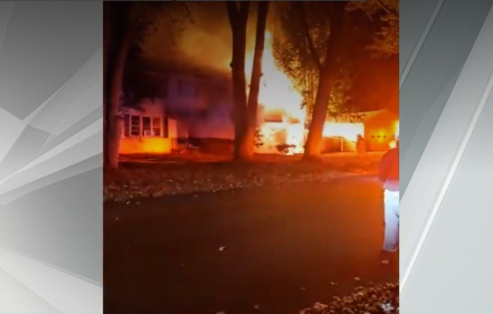 Glens Falls house fire is well involved upon firefighters arrival.