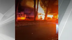 Glens Falls house fire is well involved upon firefighters arrival.