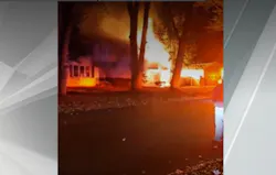 Glens Falls house fire is well involved upon firefighters arrival. Glens Falls house fire is well involved upon firefighters arrival.