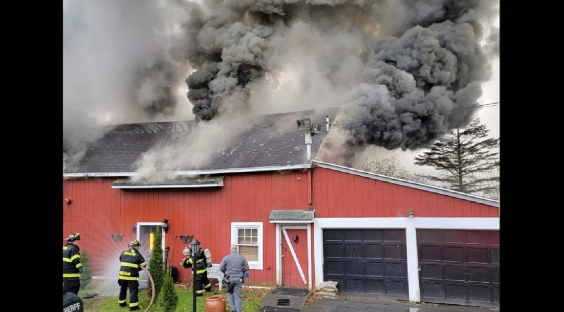 Firefighters battle heavy fire and smoke in an 1850s Inn on Nov. 28, 2021.