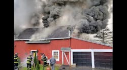 Firefighters battle heavy fire and smoke in an 1850s Inn on Nov. 28, 2021. Firefighters battle heavy fire and smoke in an 1850s Inn on Nov. 28, 2021.