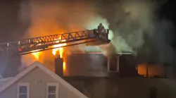 A ladder tower operates during at a fatal fire with multiple rescues and injuries