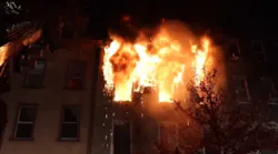 Heavy fire showing from a Brooklyn 3-story apartment that left a dozen homeless on Nov. 25, 2021
