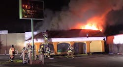 Fire crews worked to contain the fire as it broke through the roof of the Selma restaurant on Nov. 26.