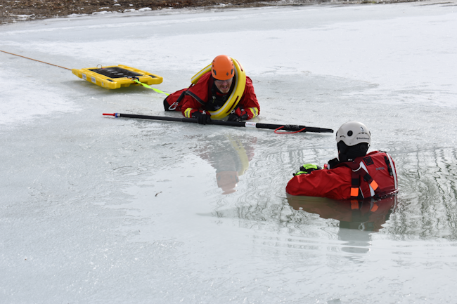 A rescue using a reach pole and a rapid transit sled.