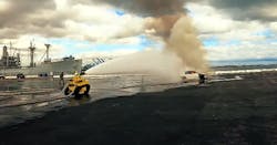 The RS3 robot extinguishing a vehicle fire. The RS3 robot extinguishing a vehicle fire.