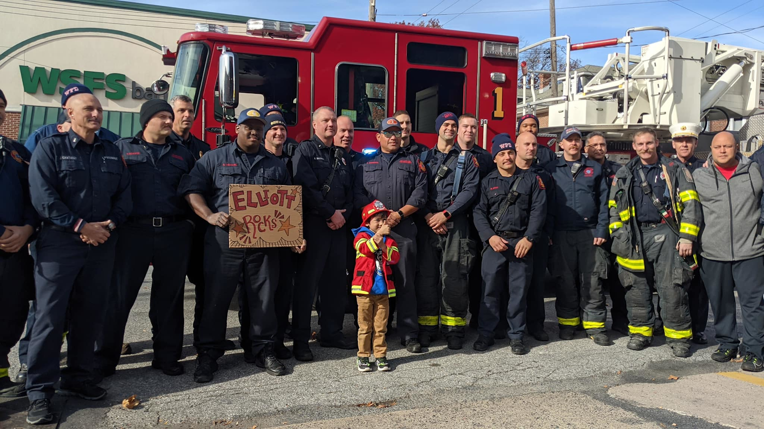 On-duty firefighters came to join Elliot Slocum after he was named a Wilmington firefighter after enduring two years of treatment for bone cancer. On-duty firefighters came to join Elliot Slocum after he was named a Wilmington firefighter after enduring two years of treatment for bone cancer.