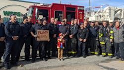 On-duty firefighters came to join Elliot Slocum after he was named a Wilmington firefighter after enduring two years of treatment for bone cancer.