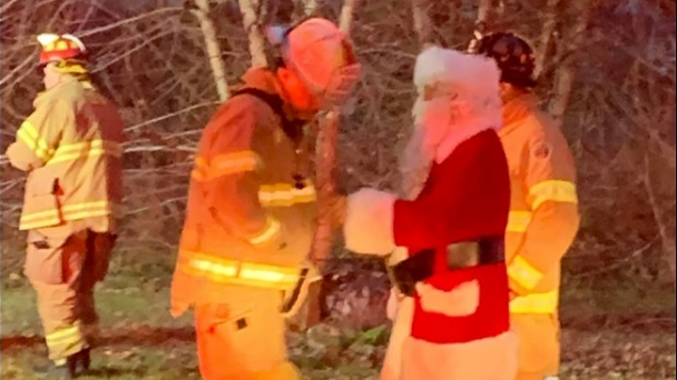 Santa was riding with Reliance Fire Company when he noticed smoke from a home and alerted the residents.