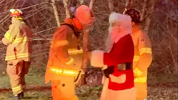 Santa was riding with Reliance Fire Company when he noticed smoke from a home and alerted the residents.