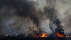 Two homes burn after being consumed by a wildfire in the Centennial Heights. Two homes burn after being consumed by a wildfire in the Centennial Heights.