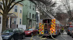 A three-alarm fire in Cambridge Wednesday morning claimed the life of an 80-year-old woman.