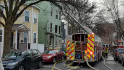 A three-alarm fire in Cambridge Wednesday morning claimed the life of an 80-year-old woman.