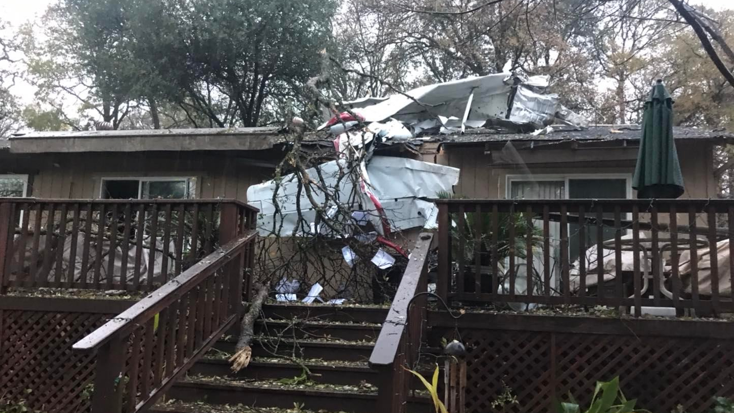 A plane landed on top of an Auburn home leaving the pilot seriously injured.