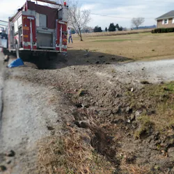 The pumper suffered a suspected tire blow out and ended up stopping after hitting a driveway pipe.