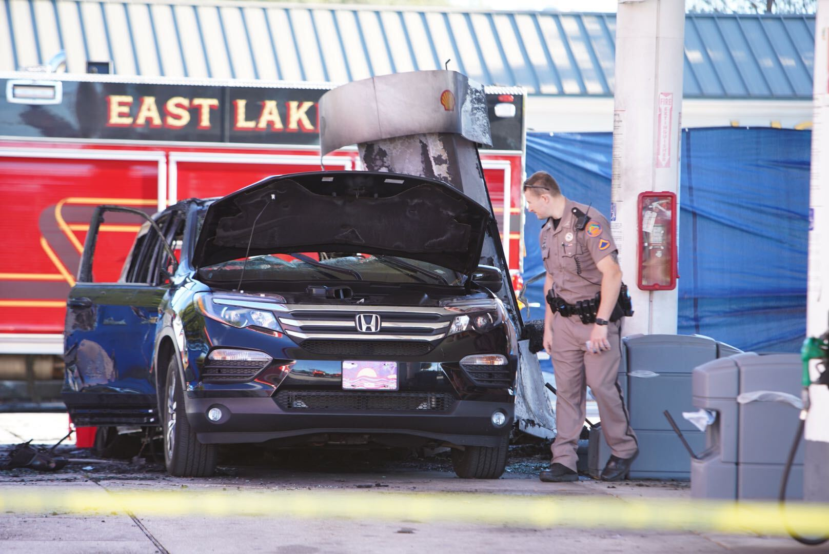 A law enforcement official at the Palm Harbor gas station where a woman was killed in a fire after a gas pump was knocked over.