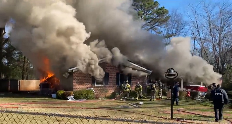 Tuscaloosa firefighters battle heavy smoke and fire conditions at a single-family dwelling on Dec. 13.