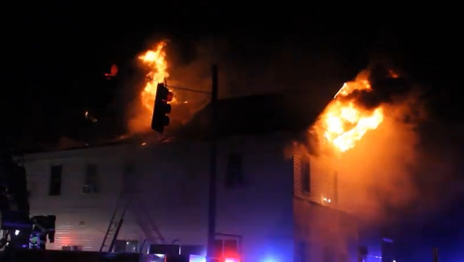 Heavy fire breaks through the attic of the restaurant in downtown Davenport.