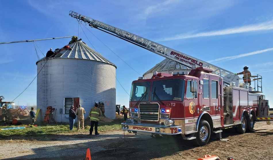 Multiple public safety agencies work to free a farmer trapped in a Mt. Auburn grain bin.