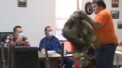 A firefighter resigns on the spot during a board meeting that promoted a once convicted arsonist to Acting Chief.