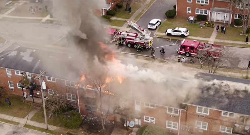 Heavy fire breaks through the roof at an apartment fire in Lakewood, NJ.
