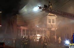 Firefighters work to control a fire in Springfield on Dec. 7, 2021. Firefighters work to control a fire in Springfield on Dec. 7, 2021.
