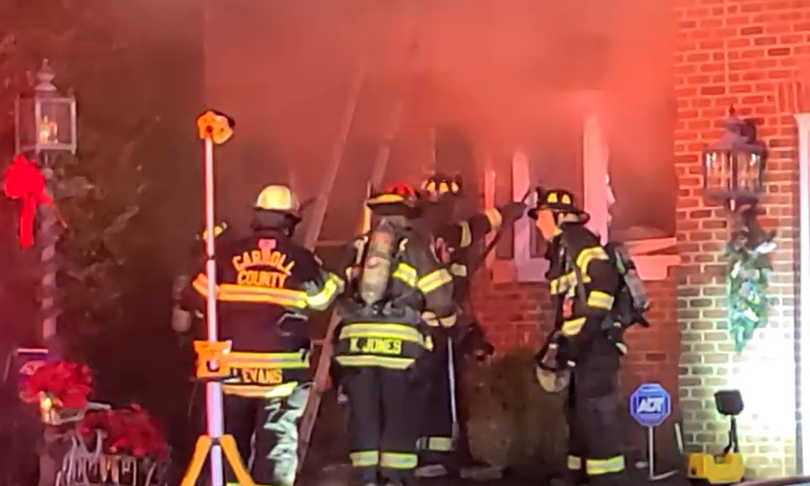 Multiple fire departments worked to control a stubborn fire in a large home in Westminster.