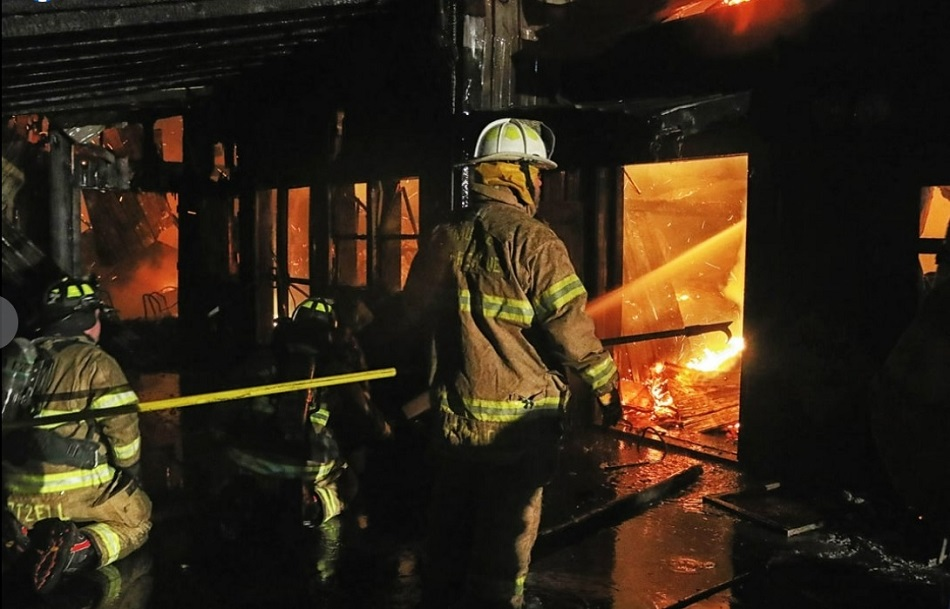 Firefighters work to control fire that devastated a NY winery.