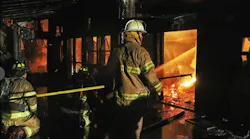 Firefighters work to control fire that devastated a NY winery.