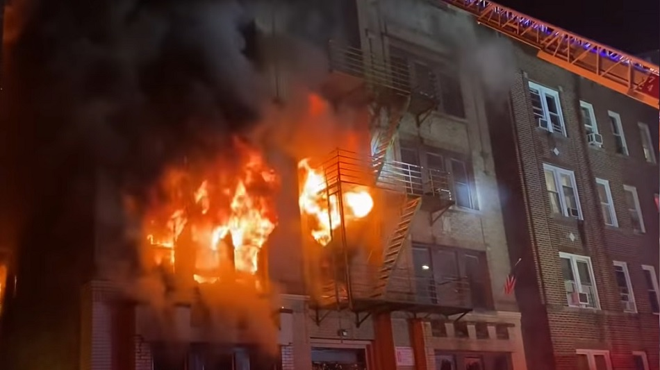 A 4-alarm fire tears through a Yonkers apartment building on Dec. 25, 2021.