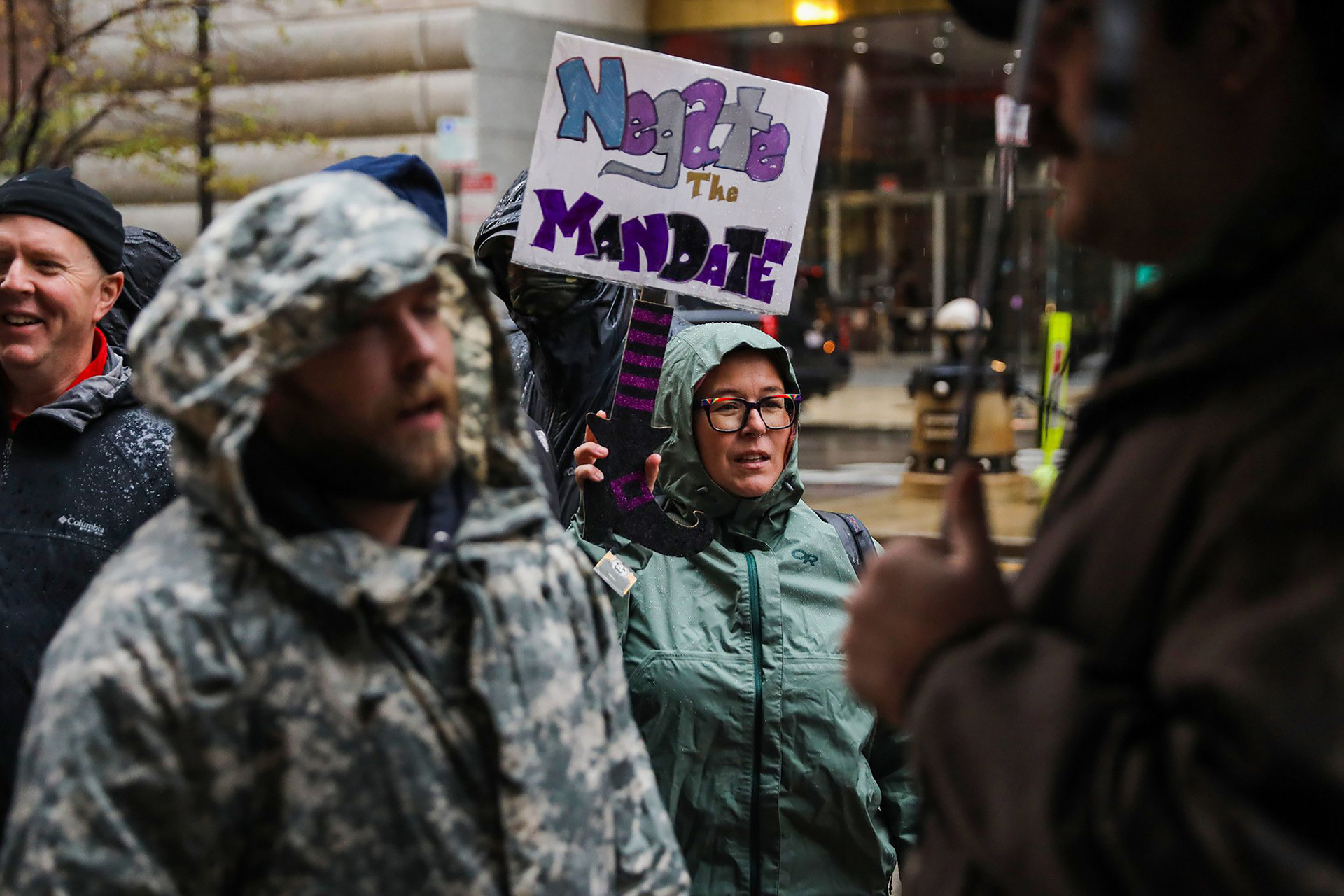 City workers and supporters rally against a vaccine mandate on Oct. 25 outside Chicago City Hall.