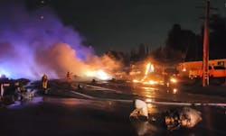 Firefighters work to extinguish the flames after an aircraft crash in El Cajon. Firefighters work to extinguish the flames after an aircraft crash in El Cajon.