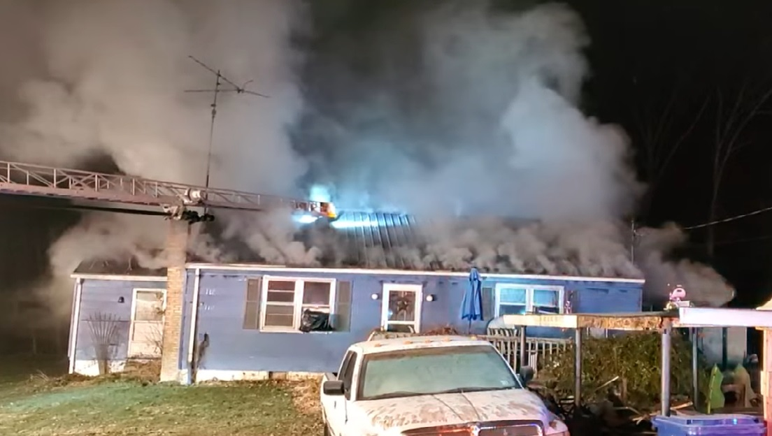 Firefighters work to control a Cumberland house fire owned by a Barlow firefighter.