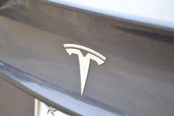 The corporate &ldquo;T&rdquo; emblem at the front or rear of an automobile only indicates that the manufacturer of the vehicle is Tesla. It doesn&rsquo;t indicate which model Tesla is involved.
