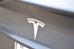 The corporate “T” emblem at the front or rear of an automobile only indicates that the manufacturer of the vehicle is Tesla. It doesn’t indicate which model Tesla is involved. The corporate “T” emblem at the front or rear of an automobile only indicates that the manufacturer of the vehicle is Tesla. It doesn’t indicate which model Tesla is involved.