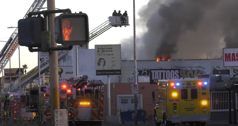 Fire crews work to control a commercial fire in Las Vegas.