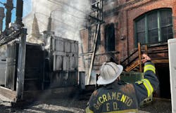 Officers survey the scene after fire damaged a substation and building in Sacramento. Officers survey the scene after fire damaged a substation and building in Sacramento.