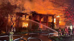 Firefighters from multiple agencies work to control fire in the home of former VA Gov. Chuck Robb