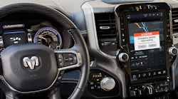 The display inside this RAM pickup displays a safety cloud alert about an approaching emergency vehicle.