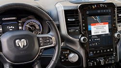 The display inside this RAM pickup displays a safety cloud alert about an approaching emergency vehicle. The display inside this RAM pickup displays a safety cloud alert about an approaching emergency vehicle.