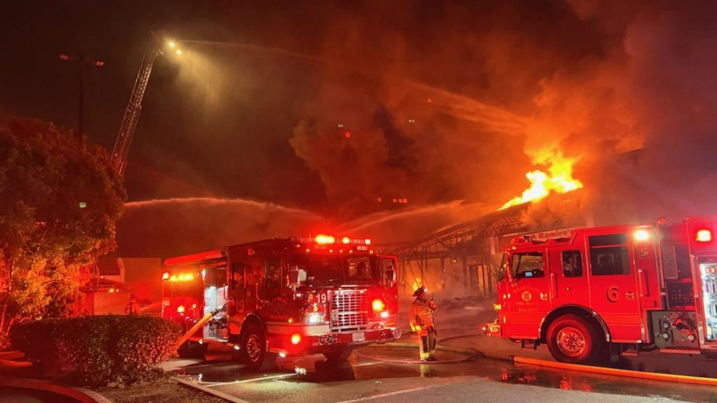 Firefighters battled a three-alarm fire in an El Cajon strip mall.