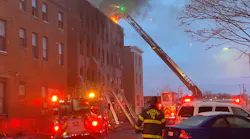 Baltimore firefighters made multiple rescues at a 4-alarm apartment fire Wednesday morning.
