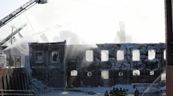 Firefighters from throughout New Jersey continue to fight the Passaic fire Saturday morning.